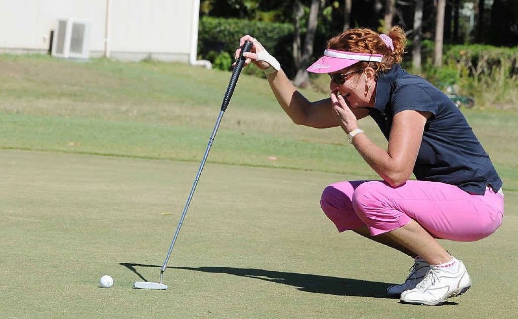 Mary Rose Risdale lines up a putt on the 18th hole at the Hervey Bay Golf and Country Club. Mary Rose Risdale lines up a putt on the 18th hole at the Hervey Bay Golf and Country Club.